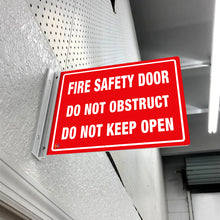 Load image into Gallery viewer, FIRE SAFETY DOOR DO NOT OBSTRUCT DO NOT KEEP OPEN - DOUBLE SIDED OFF WALL SIGN