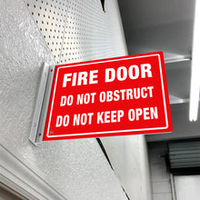 Load image into Gallery viewer, FIRE DOOR DO NOT OBSTRUCT DO NOT KEEP OPEN - DOUBLE SIDED OFF WALL SIGN