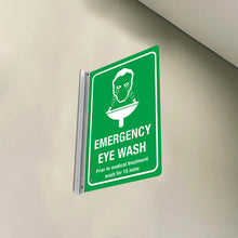 Load image into Gallery viewer, EMERGENCY EYE WASH PRIOR TO MEDICAL TREATMENT WASH FOR 15 MINS - DOUBLE SIDED OFF WALL SIGN